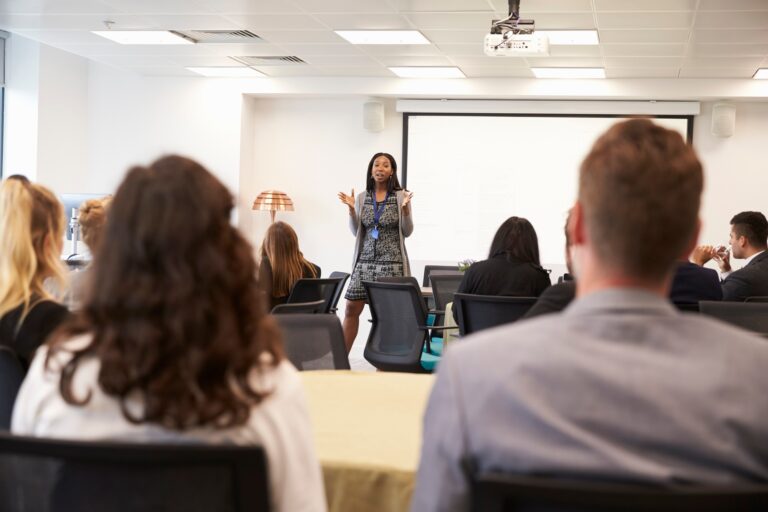 Businesswoman Making Presentation At Conference