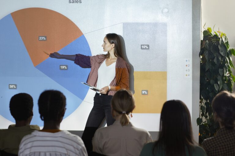 Young Woman Speaking at Business Conference